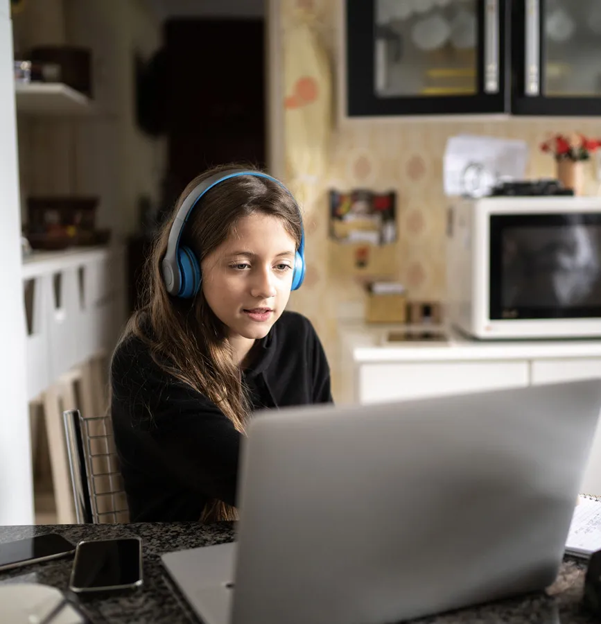 a student using our online live classes and curriculum provider courses from home